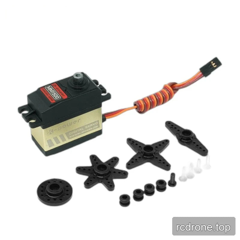 MM1500 servo with coiled lead and connector, four black servo horns, mounting bushings, and screws laid out beside it.