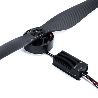 Drone power combo with large brushless motor and two-blade propeller connected to a finned ESC module