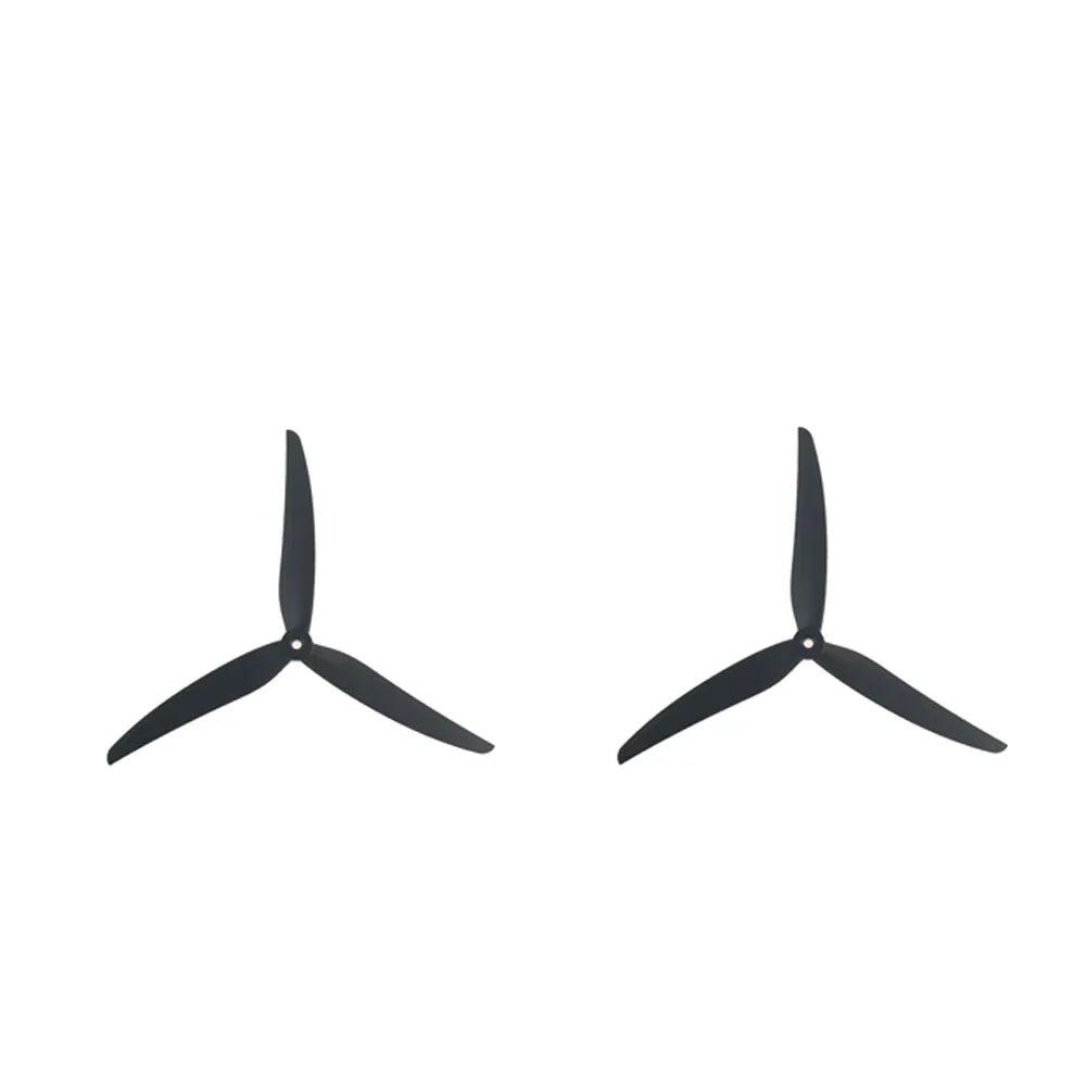 Two black tri-blade propellers shown side by side, matching left and right rotation set