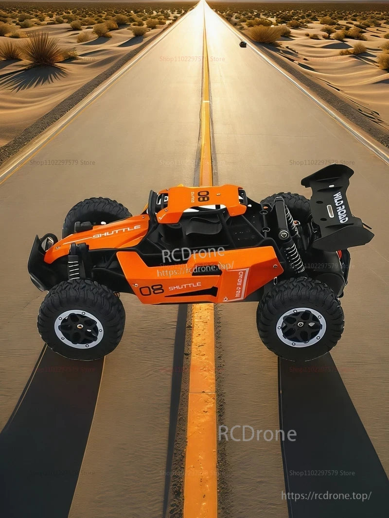 Orange 1:16 RC car, Shuttle 08 model, desert road, black tires, detailed suspension.