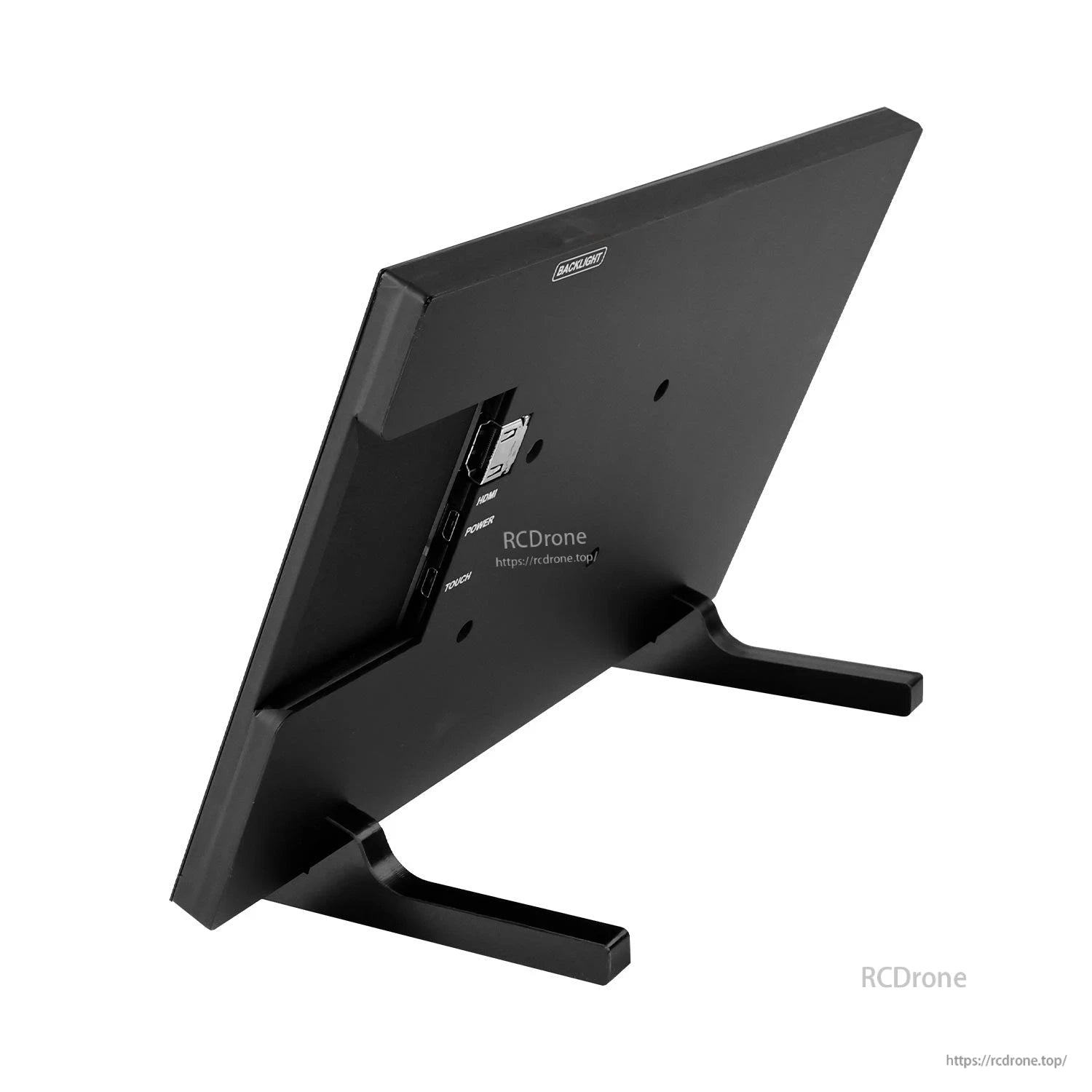 Rear angled view of monitor with dual desktop stand and recessed ports panel