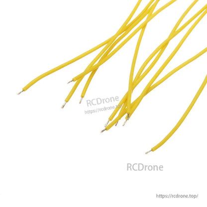 Yellow silicone wire leads close-up showing pre-stripped conductor tips