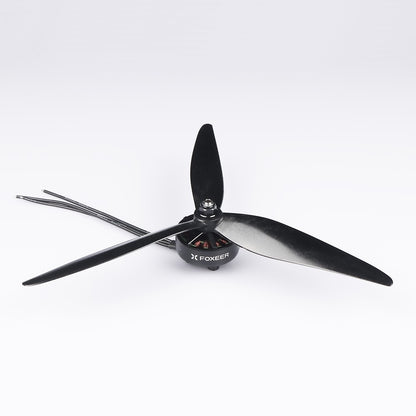 Foxeer Cyclone tri-blade drone propeller mounted on a motor, black glass-fiber style prop with 5mm hub