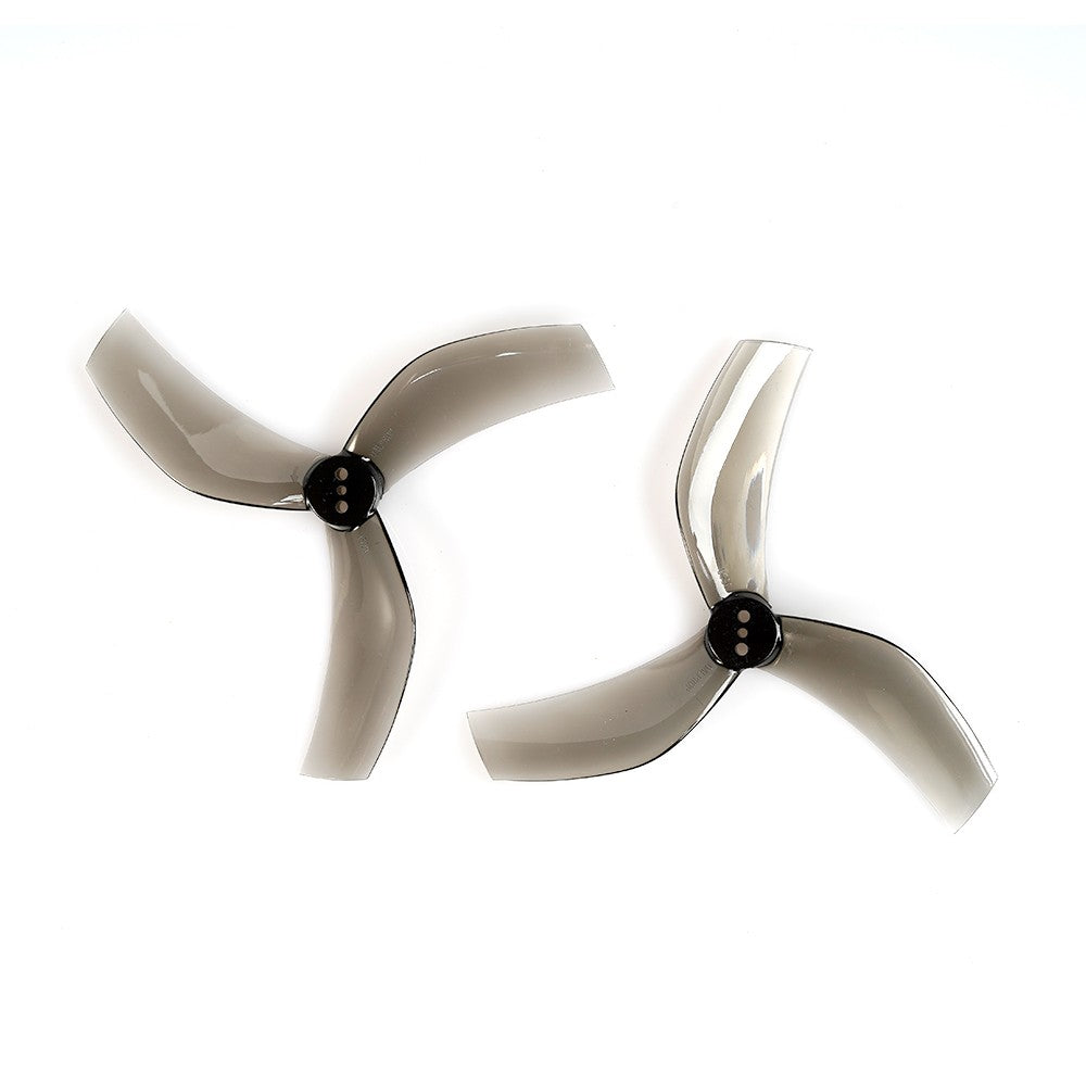 Dalprop Cyclone T-mount tri-blade drone propellers in translucent smoke gray with three-hole hubs