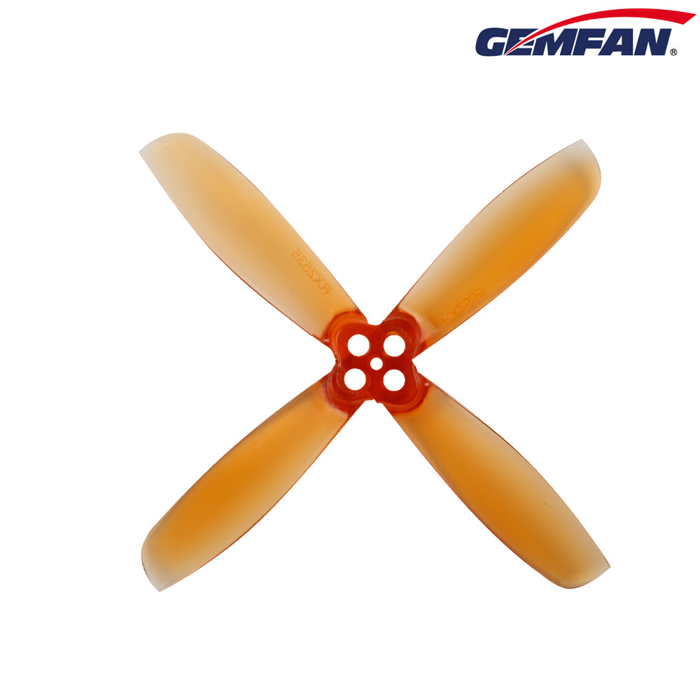 Gemfan Improved RotorX 2535 four-blade propeller in translucent orange, top view