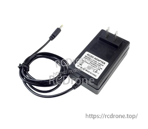 AC/DC power adapter with US two-prong plug and DC barrel connector cable, specification label visible