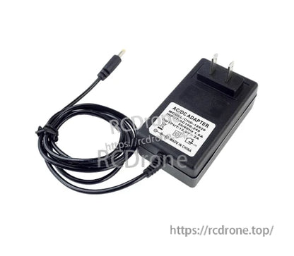 AC/DC power adapter with US two-prong plug and DC barrel connector cable, specification label visible