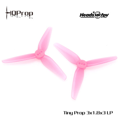 Pink tri-blade propeller pair on white background with HQProp and HeadsUpFPV logos, labeled Tiny Prop 3x1.8x3