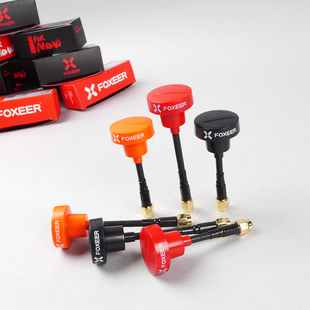 FOXEER Pagoda PRO 5.8G RHCP Omni FPV Antenna, FOXEER Pagoda PRO 5.8GHz FPV omni antennas in red, orange and black with short coax leads and gold SMA connectors