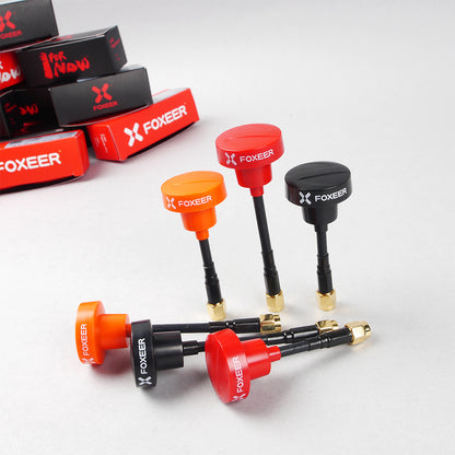 FOXEER Pagoda PRO 5.8G RHCP Omni FPV Antenna, FOXEER Pagoda PRO 5.8GHz FPV omni antennas in red, orange and black with short coax leads and gold SMA connectors
