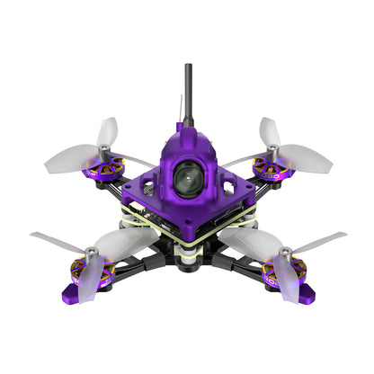 Firefly Nano Baby V3 micro quad drone with purple canopy, front camera lens, top antenna, and four propellers