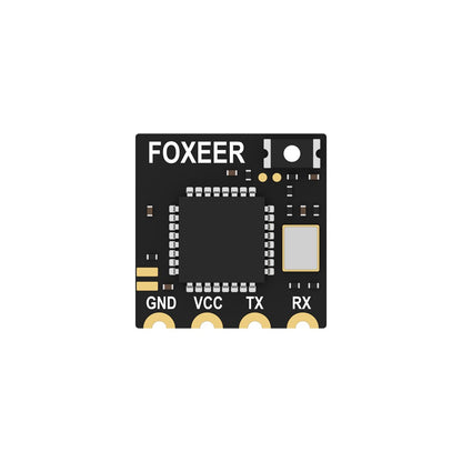 Foxeer ELRS Lite 2.4G receiver PCB with FOXEER logo and labeled pads for GND, VCC, TX and RX