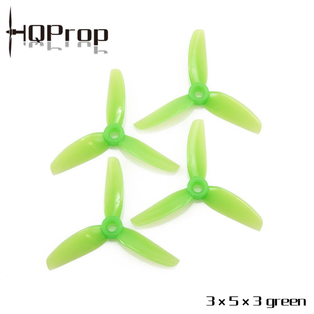 HQProp 3x5x3 green tri-blade propeller set, four pieces shown on white background