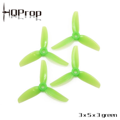 HQProp 3x5x3 green tri-blade propeller set, four pieces shown on white background