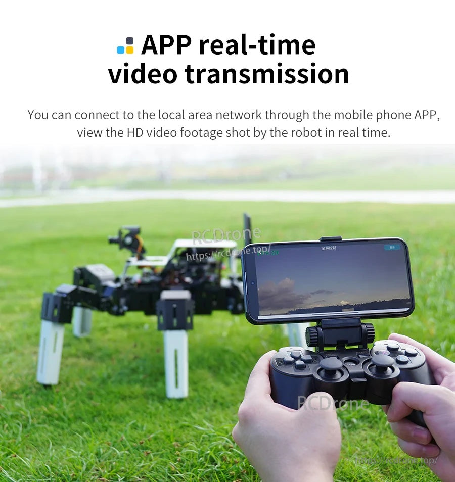 Mobile app real-time video transmission with phone on controller and hexapod in the background on grass