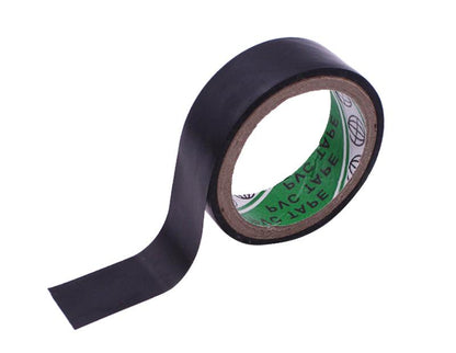 PVC black insulating adhesive tape roll with loose end, close-up on white background