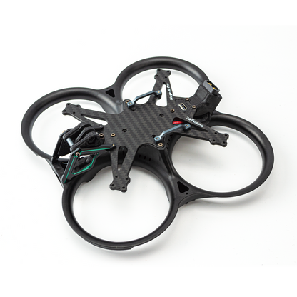 Angled top view of ducted frame showing carbon fiber plate cutouts and wiring route openings