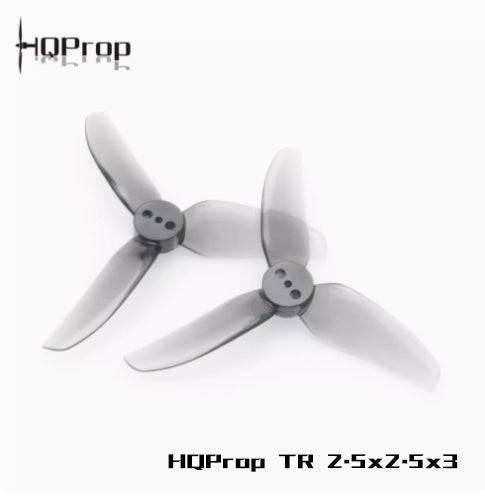 Two grey HQProp TR 2.5x2.5x3 tri-blade propellers shown together, hub and blades visible