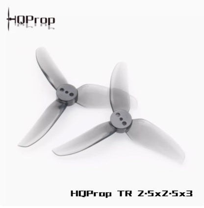 Two grey HQProp TR 2.5x2.5x3 tri-blade propellers shown together, hub and blades visible