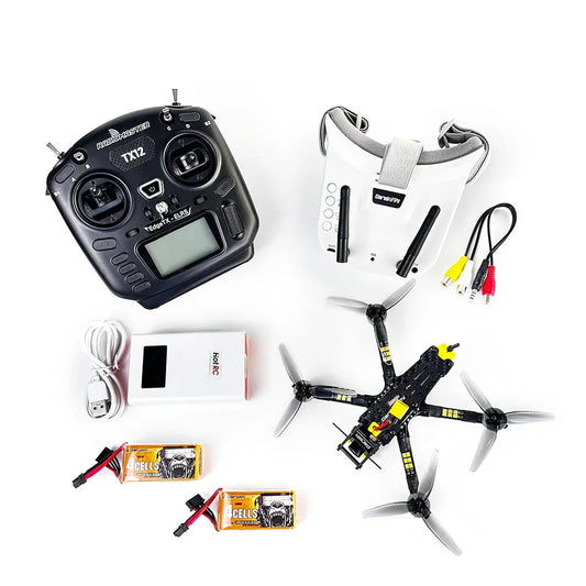 DarwinFPV FPV drone kit flat lay with TX12 radio transmitter, goggles, quadcopter, charger, cables and two batteries