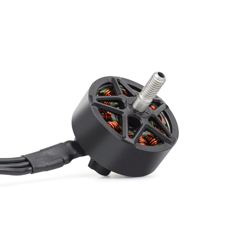 Angled view of MY 2810 motor showing open top cage, copper windings, and wire lead