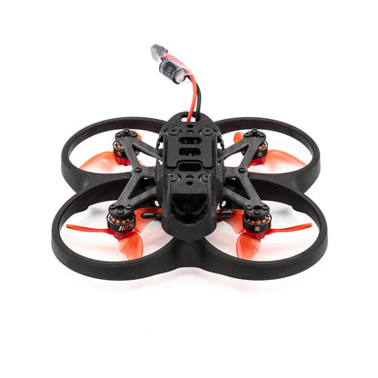 EMAX Cinehawk Mini 2.5-inch ducted racing drone frame with orange tri-blade props, top view