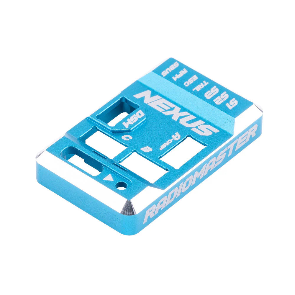 Angled view of blue aluminum Nexus case showing machined edges and Radiomaster side engraving