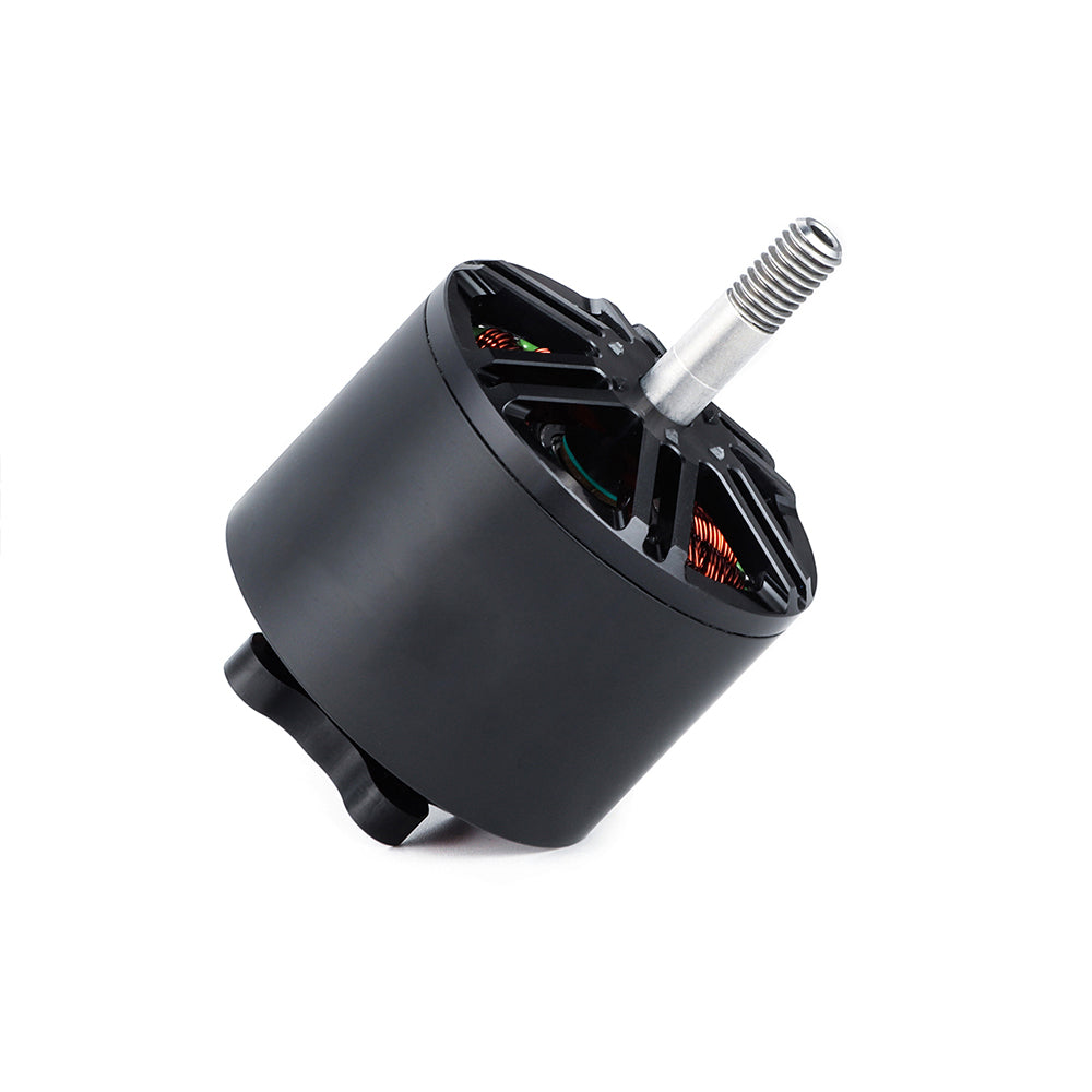MAD BSC 3120 FPV Drone Motor, MAD BSC 3120 FPV drone brushless motor with black housing, exposed copper windings, and threaded shaft