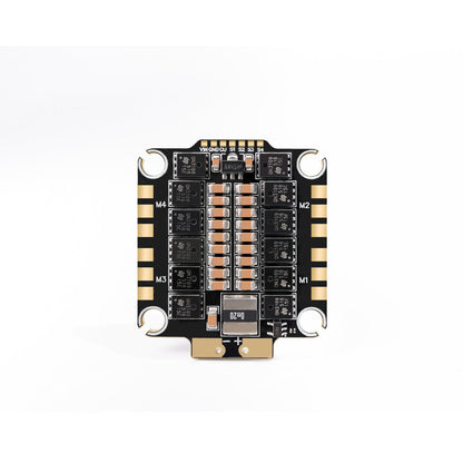 HGLRC 60A 4in1 6S 8-bit V2 ESC top side view with motor pads and capacitors