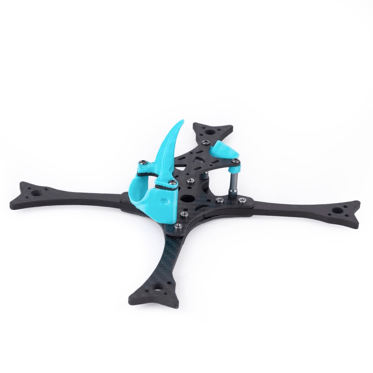 Assembled carbon FPV drone racing frame, angled side view showing stack standoffs and blue TPU camera mount