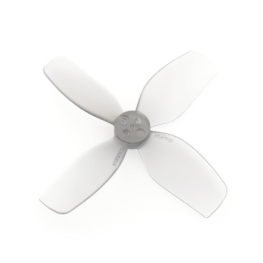 HQProp DT63MMX4 63mm 4-blade polycarbonate propeller in light grey, single prop close-up