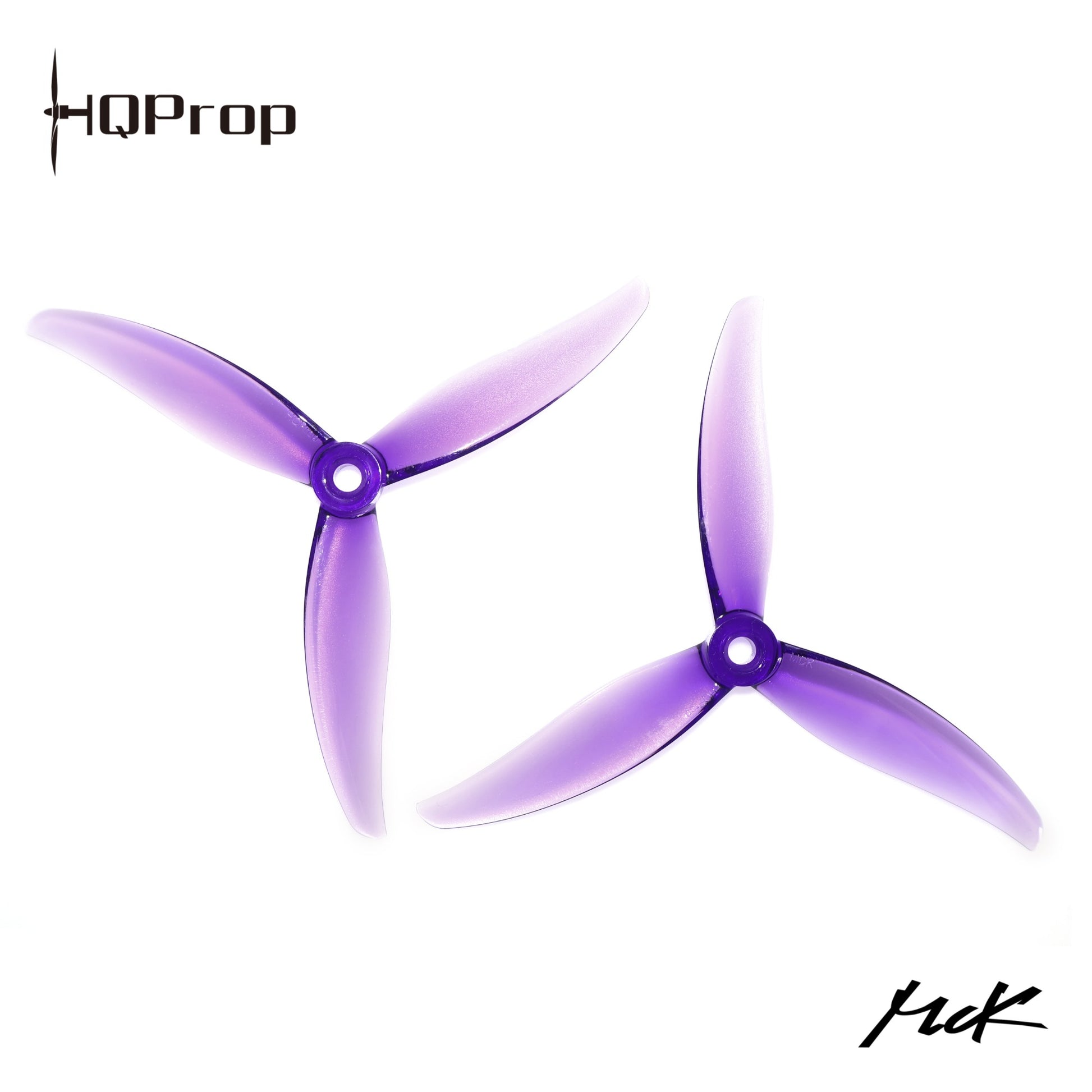 HQProp MCK-PC 5.1in 3-blade propellers in translucent purple, pair shown top view