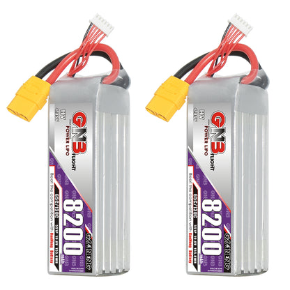 Two upright views of GNB 8200mAh HV LiPo pack showing label side and wiring with XT90 connector