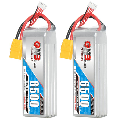 Two GAONENG GNB 6500mAh 4S LiPo batteries standing upright with yellow XT90 connectors