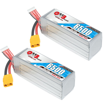 Two GNB 6500mAh LiPo packs shown at angle with yellow XT90 connectors and balance leads