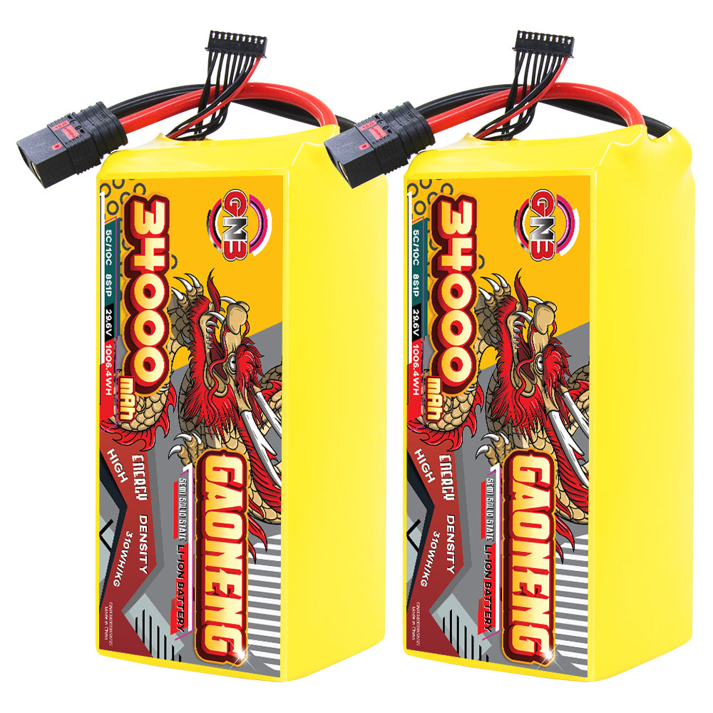 Two GAONENG GNB 34000mAh 8S battery packs shown side by side with QS8-style discharge leads