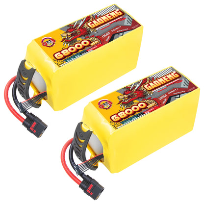 Two yellow GAONENG 68000mAh battery packs shown at angle with discharge lead and balance cable