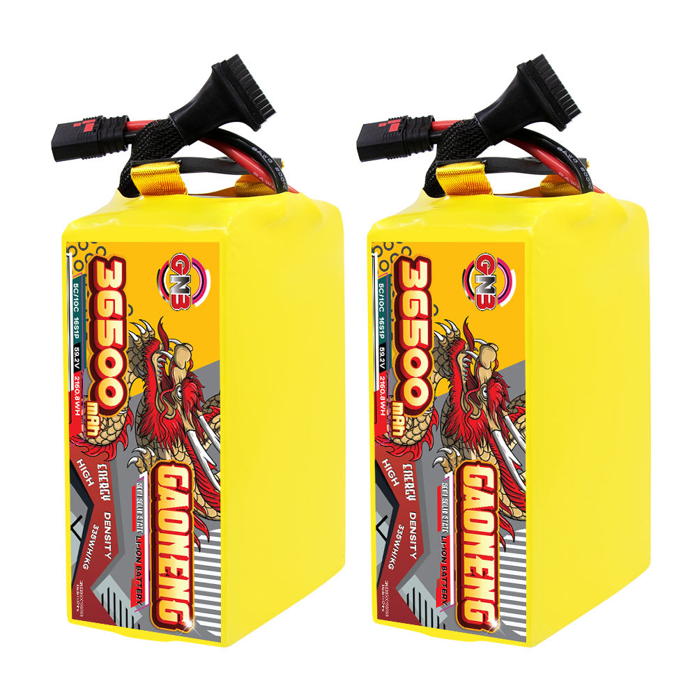 Two GAONENG GNB 36500mAh 16S battery packs standing upright, front label view with cable leads