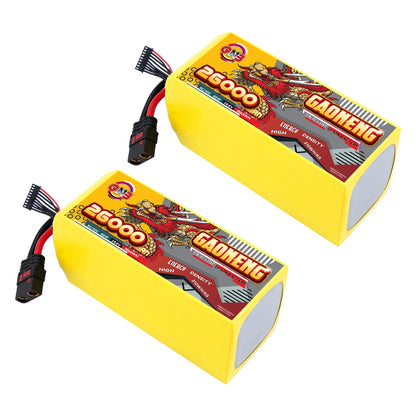 Two GAONENG 26000mAh battery packs shown at an angle, yellow shrink wrap with QS8 connectors attached