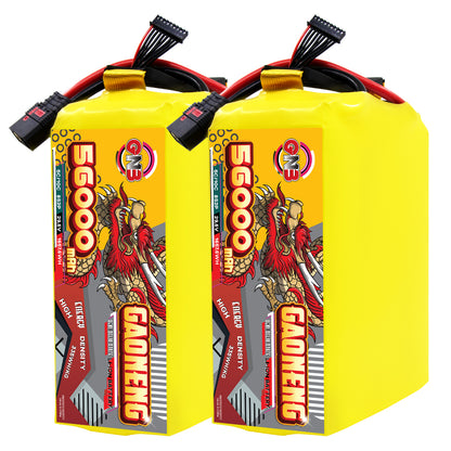 Two GAONENG 56000mAh 8S battery packs standing side by side with attached power and balance leads