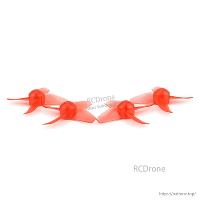 Side profile lineup of four translucent red 4-blade props showing blade curvature and clearance
