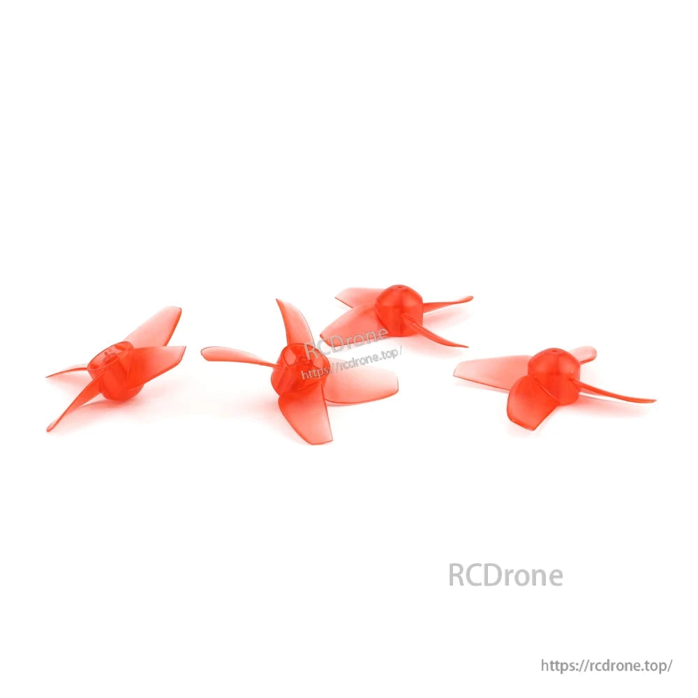 2 pairs of red 40mm 4-blade drone propellers arranged in a row on white background