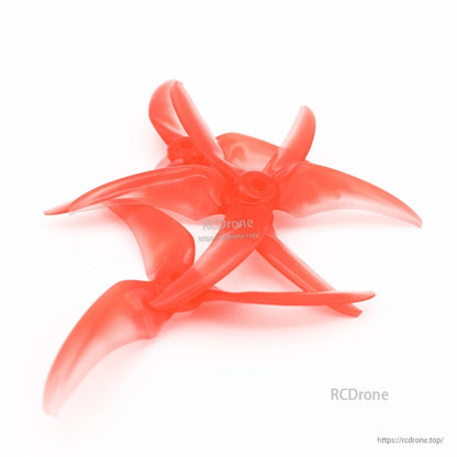 2 pairs EMAX Avan Scimitar 4024 CW/CCW 3-blade propellers in translucent red, grouped view
