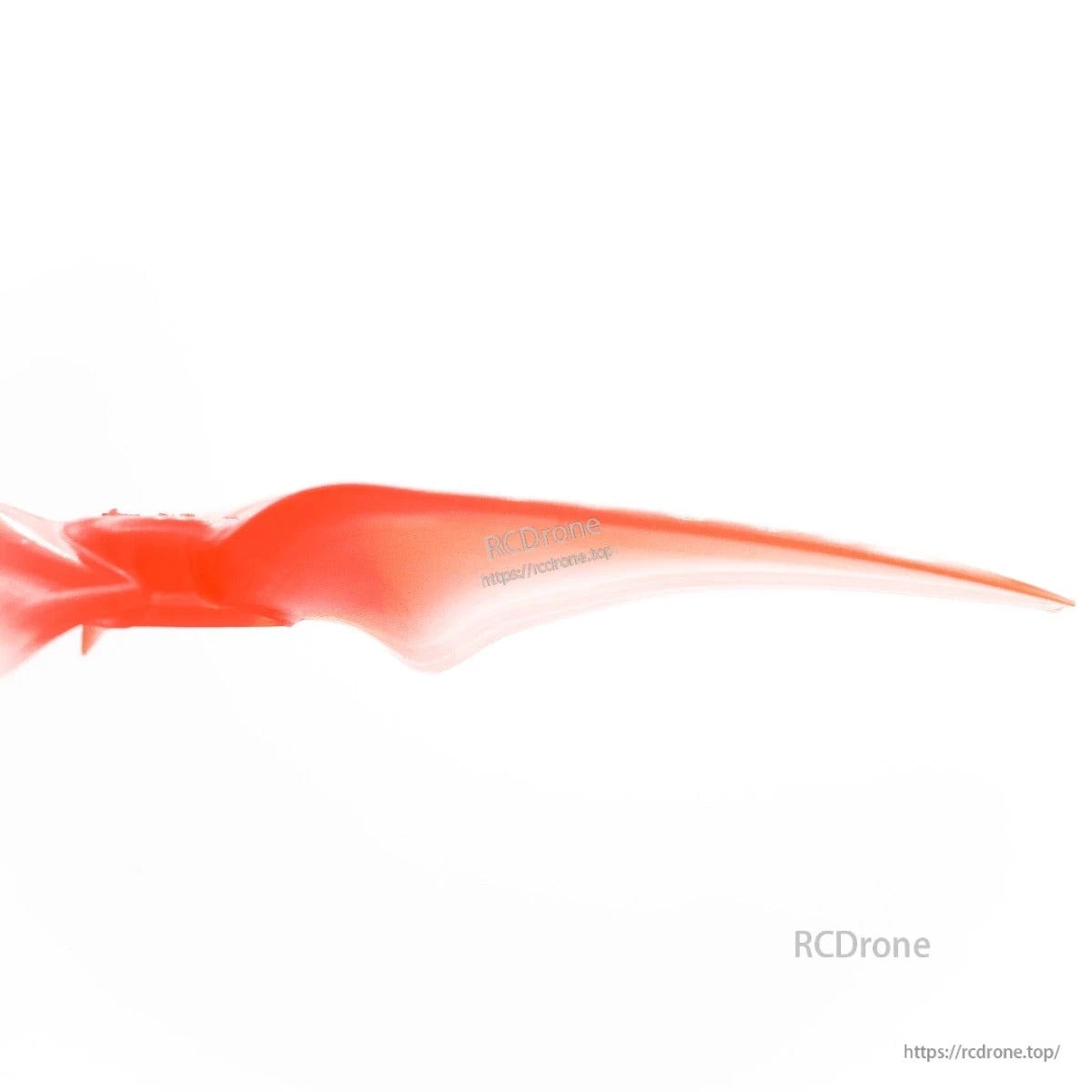 Side profile close-up of a translucent red tri-blade propeller blade for 4-inch FPV drone