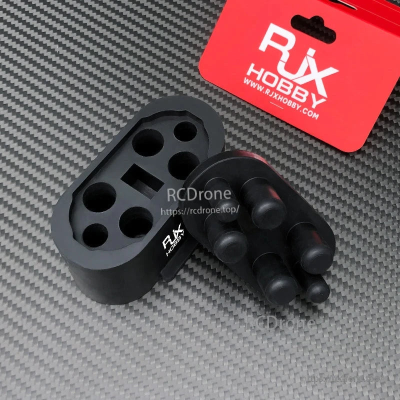 2 Sets RJX Rubber Protective Cover, Two RJX Hobby black rubber protective covers with molded holes and rounded grip bumps, sold as a 2-pack