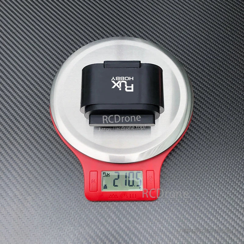 2 Sets RJX Rubber Protective Cover, RJX Hobby rubber protective cover on digital scale, weighing about 21.05 g