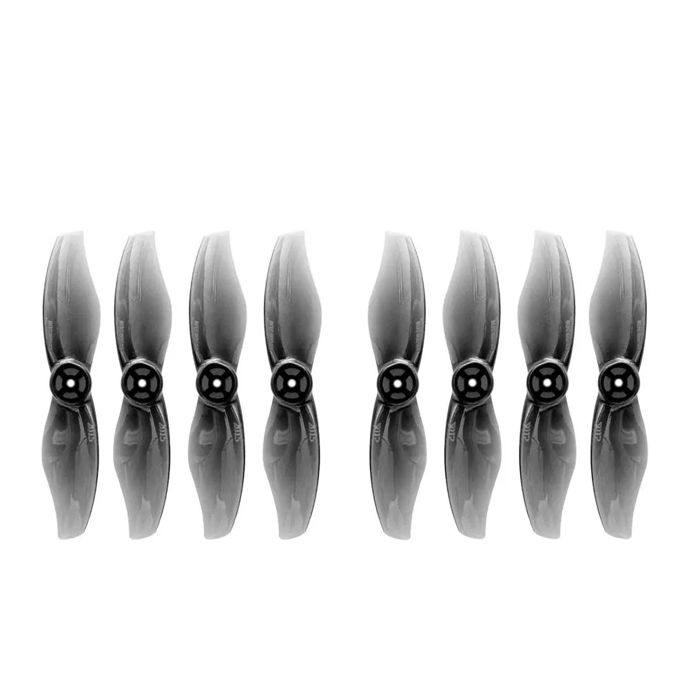 Gemfan Durable 2015 2-Blade 2" Propeller, Set of eight Gemfan 2015 2-blade 2-inch drone propellers in translucent gray with hub mounting holes
