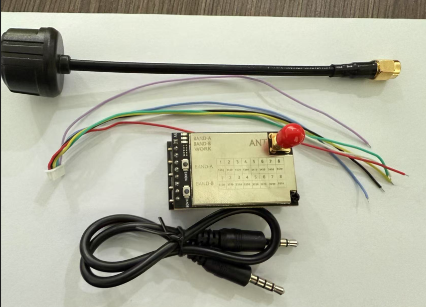 RCDrone R3340 3.3GHz Analog Video Receiver VRX, Compact 3.3GHz analog video receiver with antenna, LED channel select, 5V, 50 ohm, and multicolored wiring.