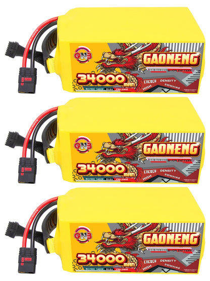 Three GAONENG 34000mAh battery packs stacked horizontally, showing labels and discharge leads