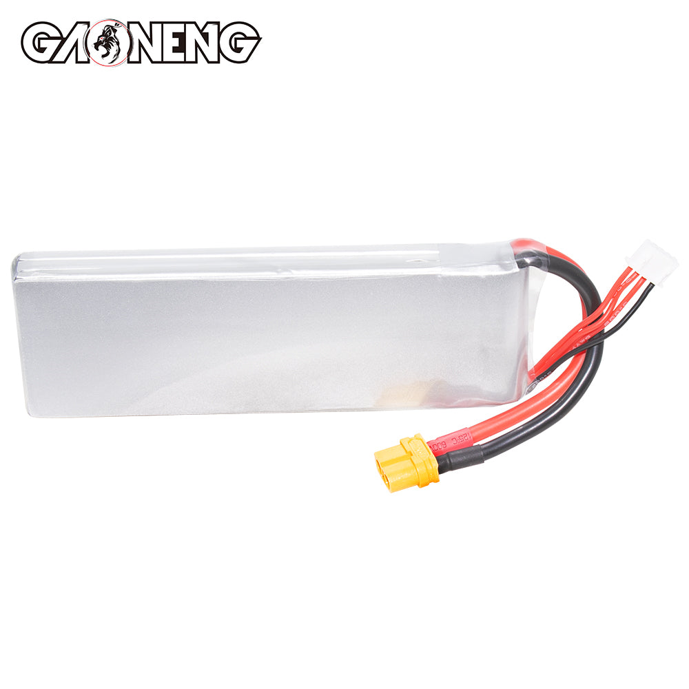Back side of silver LiPo battery pack without label, showing wiring exit and XT60 connector